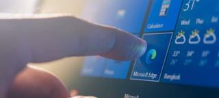 Lag Microsoft Edge Vis nedlastinger nederst i nettleseren